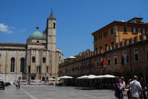 a group of people standing in front of a building at A Casa di Lola in Ascoli Piceno