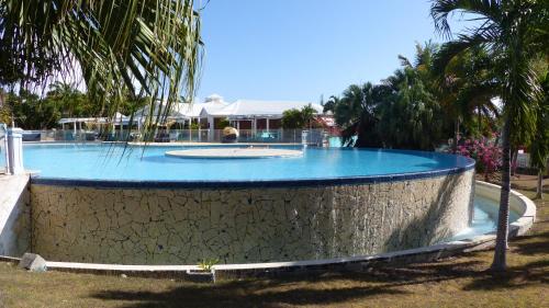 Bazén v ubytování Appartement à la Résidence LA PLANTATION RESORT and SPA nebo v jeho okolí