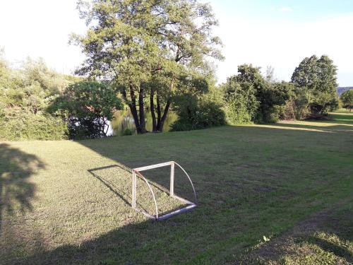 a soccer goal sitting in the middle of a field at Apartments Korana, BelajskePoljice in Duga Resa