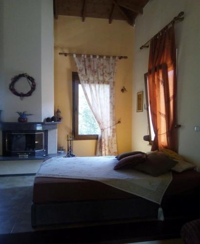 Ένα ή περισσότερα κρεβάτια σε δωμάτιο στο Kavala Villa 360 degrees green