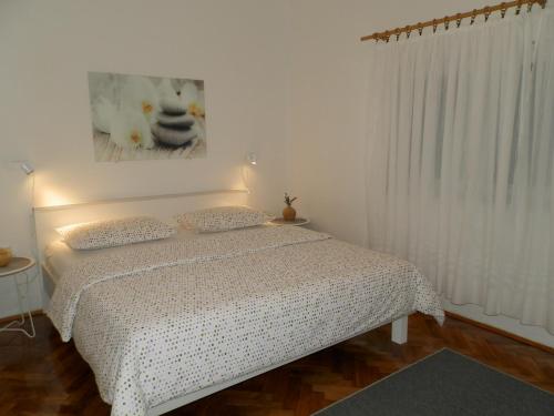 Voodi või voodid majutusasutuse Apartment Slavica toas