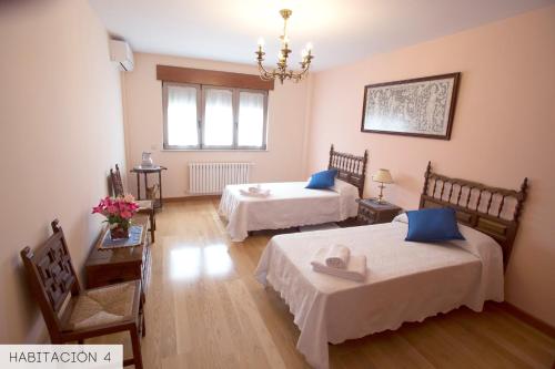 Ένα ή περισσότερα κρεβάτια σε δωμάτιο στο CasaMiranda30