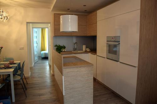 Η κουζίνα ή μικρή κουζίνα στο Apartament Zawiszy Czarnego 10