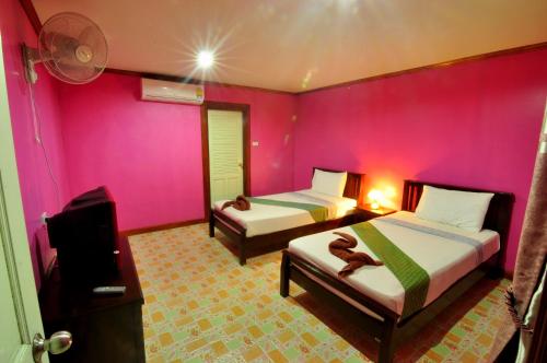 Katil atau katil-katil dalam bilik di Sand Sea House