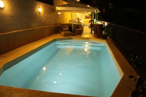 Der Swimmingpool an oder in der Nähe von Casa Di Lucia Mi-Hotel