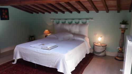 Ένα ή περισσότερα κρεβάτια σε δωμάτιο στο Il Nido della Formica