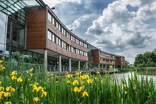 a building with yellow flowers in front of it at The Jubilee Hotel in Nottingham