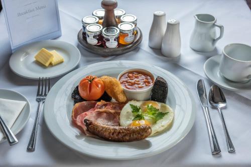 a plate of breakfast food on a table at Petwood Hotel in Woodhall Spa