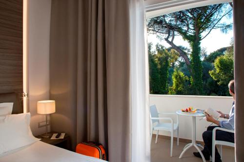 Posteľ alebo postele v izbe v ubytovaní Hotel Marad