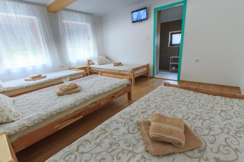Postel nebo postele na pokoji v ubytování Fortuna Apartments
