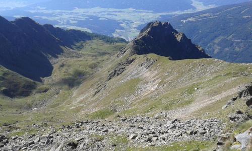a view of a rocky mountain with a valley at Karnerhof in Mariapfarr