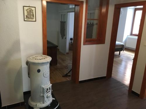 a hallway with a room with a door and a room with a room at Le P'retzel & Le Sticksy in Riquewihr