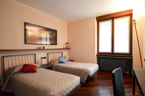 Postel nebo postele na pokoji v ubytování Villa Onorina