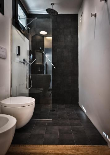 Un baño de Teku Sardinia Boutique Hotel