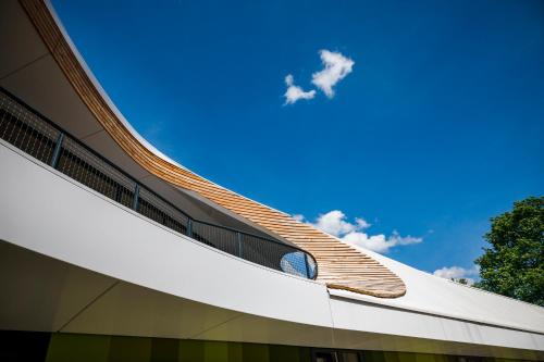 a building with a staircase on the side of it at Jugendherberge Bayreuth in Bayreuth