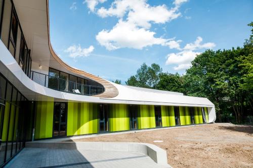 a building with green and yellow stripes on it at Jugendherberge Bayreuth in Bayreuth
