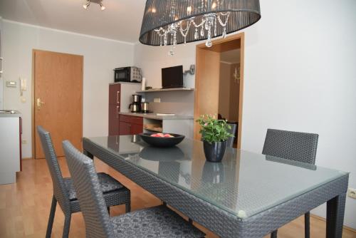 a dining room with a table and chairs at Schlafen in Weimar in Weimar