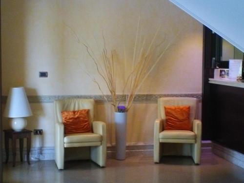 Un lugar para sentarse en Palmed Hotel