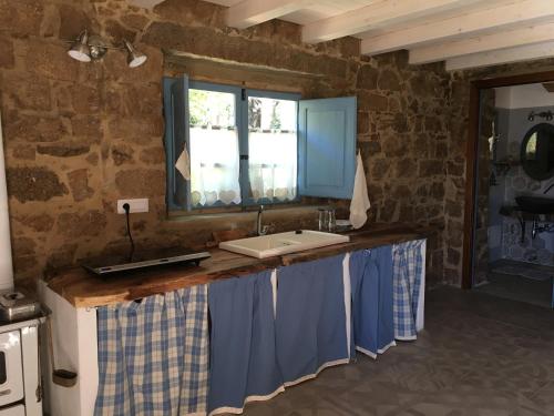 Kuchyň nebo kuchyňský kout v ubytování Agriturismo La Casa delle Fate