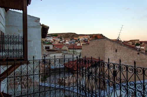 a view of a city from a balcony at Yoruk Stone House in Nevsehir
