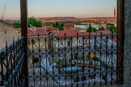 a balcony with a view of a city at Yoruk Stone House in Nevsehir