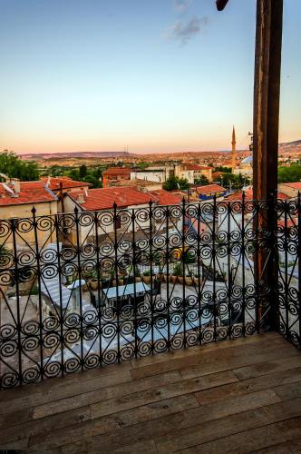 a view of a city from a balcony at Yoruk Stone House in Nevsehir