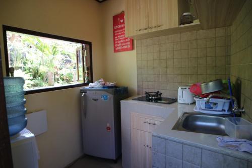 Kuchyň nebo kuchyňský kout v ubytování Home-Bience Hostel