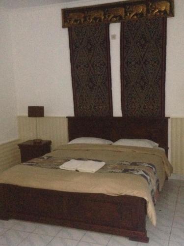 Ένα ή περισσότερα κρεβάτια σε δωμάτιο στο Meriki Apartment