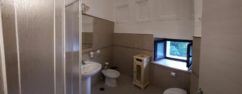 Koupelna v ubytování B&B La Taverna