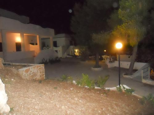 Κήπος έξω από το Residence Dolce Far Niente
