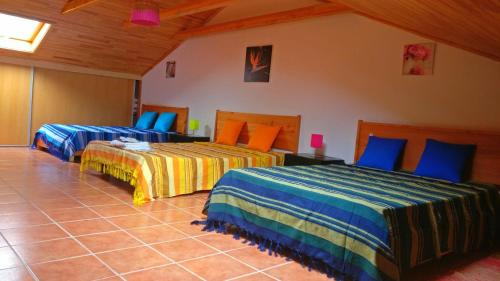 Giường trong phòng chung tại Casa del Mar