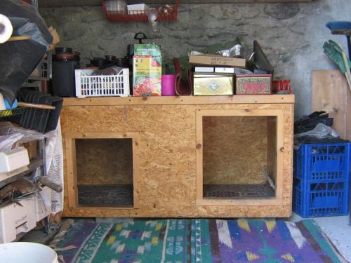 a room with a wooden table with two windows at Breckenbreck monolocale CIN IT7001C2P4NVWOPA in Allein