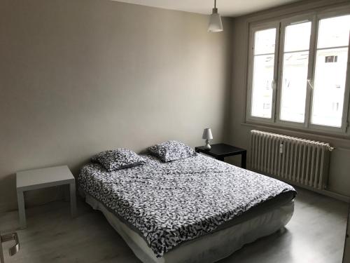 Cama o camas de una habitación en Appartement Flachet