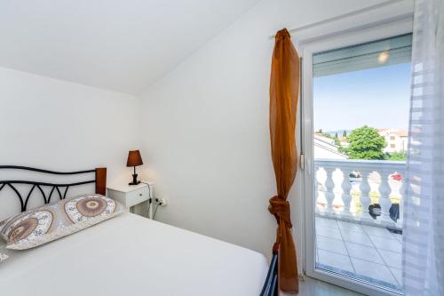 Postel nebo postele na pokoji v ubytování Apartment Juresko
