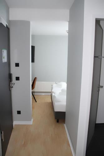 En eller flere senge i et værelse på mk | hotel münchen city