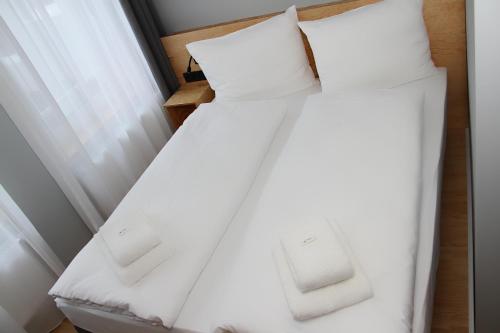 En eller flere senge i et værelse på mk | hotel münchen city