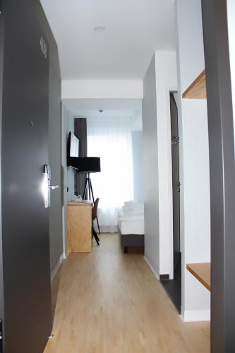 En eller flere senge i et værelse på mk | hotel münchen city