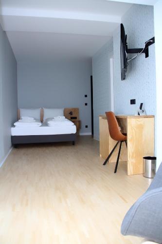 En eller flere senge i et værelse på mk | hotel münchen city
