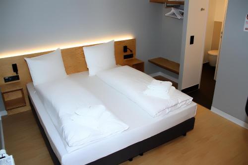 En eller flere senge i et værelse på mk | hotel münchen city