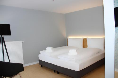 En eller flere senge i et værelse på mk | hotel münchen city