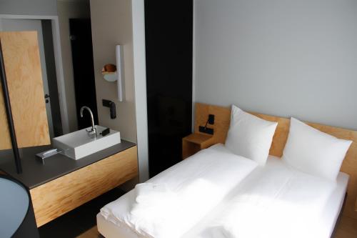 En eller flere senge i et værelse på mk | hotel münchen city