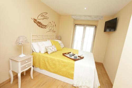 A bed or beds in a room at vivienda vieja cepa