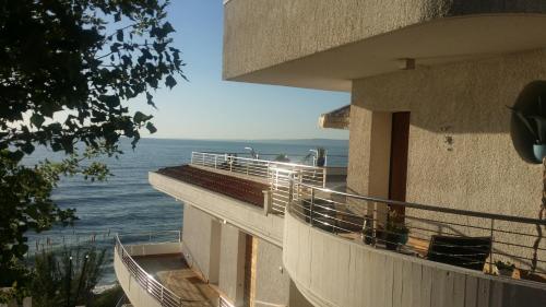 a balcony of a building with a view of the ocean at B&B alla Canale in Vasto