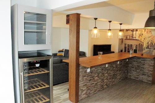 Η κουζίνα ή μικρή κουζίνα στο Santos Deluxe Apartment