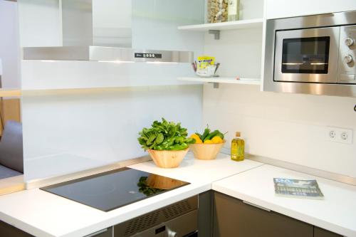 Η κουζίνα ή μικρή κουζίνα στο Smart Suites Albaicin