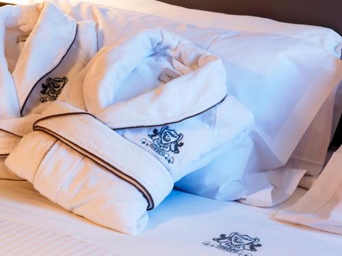Postel nebo postele na pokoji v ubytování Hotel Torresi