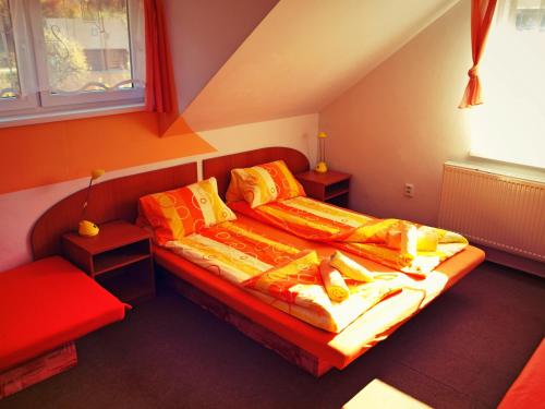 Ένα ή περισσότερα κρεβάτια σε δωμάτιο στο Hotel Bocy