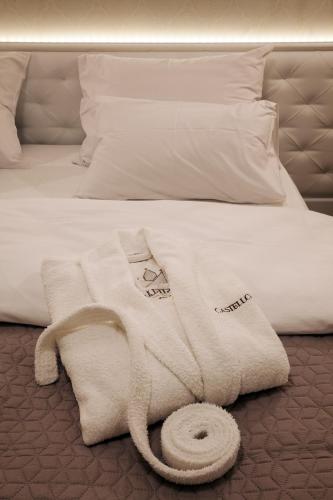 Кровать или кровати в номере Castello Boutique Hotel