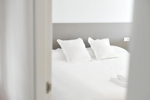 Ένα ή περισσότερα κρεβάτια σε δωμάτιο στο Smart Suites Albaicin