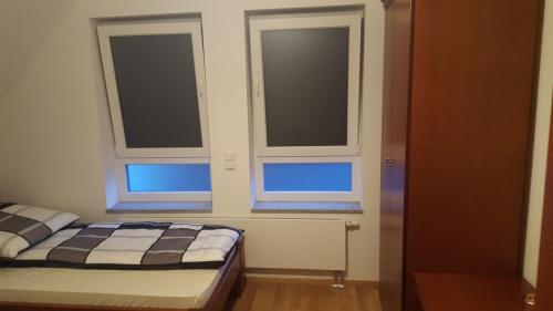 Postel nebo postele na pokoji v ubytování Apartments in Weissenhorn